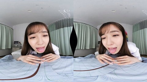Cute Asian girl in white top sticks out tongue in VR hospital tease