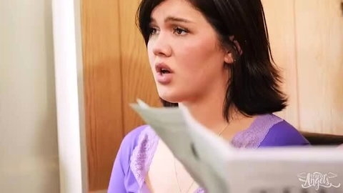 Daisy Taylor in purple lingerie reading paper, shocked expression