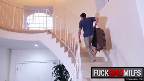 Darcie Belle stepmom in tight shorts carrying suitcase upstairs