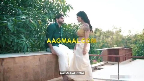 Busty Indian MILF in white saree with man on terrace