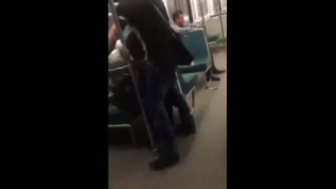 Asian twink kneels for older man's BJ in public subway