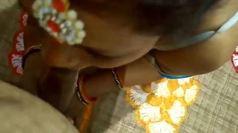 Desi Bhabhi44 in red bangles and hair jewelry, sultry closeup
