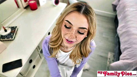 Petite blonde freckled teen stepsister looks up seductively in taboo POV tease