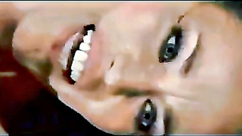 Daisy Layne smiling ecstatically in squirting orgasm close-up