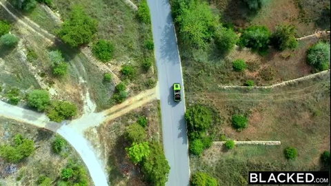 Venera Maxima in neon green Jeep on rural road - Blacked
