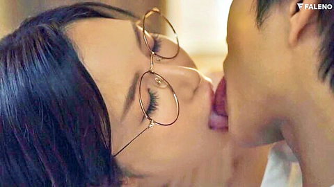 Japanese brunette babe in glasses passionately French kissing guy with tongues touching