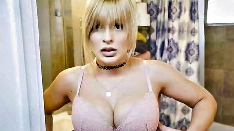 Curious blonde babe in pink lacy bra and choker teases cleavage for stepdad