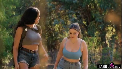 Penny Barber and Codi Vore hiking together in revealing crop tops