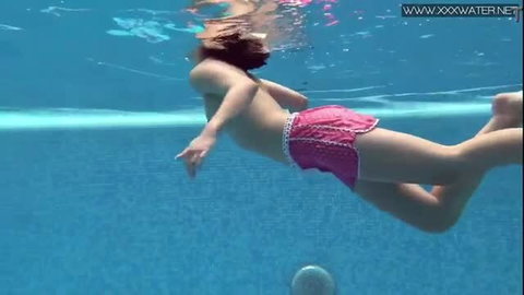 Lady Dee swimming underwater in pink shorts, cute Czech teen