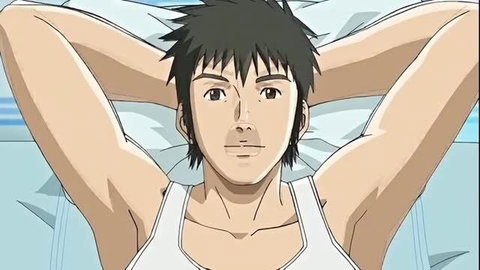 Handsome muscular Asian man in white tank top lying in bed