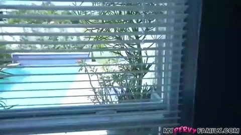Gia Ohmy peeking through blinds at pool