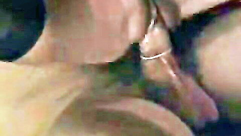 Rebecca Lord blonde in glasses giving close-up blowjob