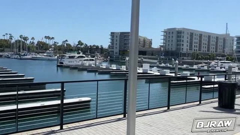 Bella Rolland in bikini at marina outdoor setting