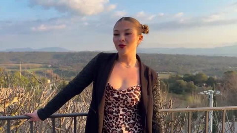 Steffy 18yo Cap d'Agde beauty in leopard print top and black blazer outdoors
