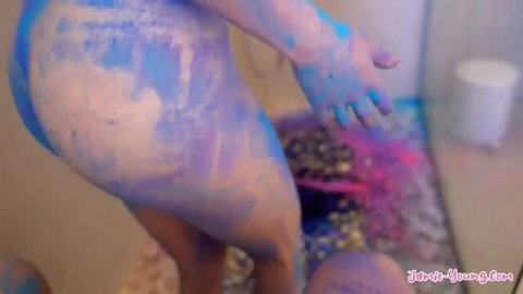 Jamie Young covered in colorful body paint, thick ass visible in shower