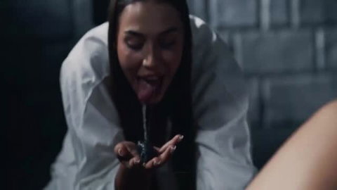 Clemence Audiard drooling saliva onto Dolly X in lesbian horror porn scene