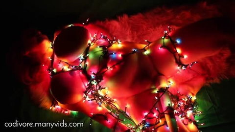 Codi Vore nude with Christmas lights as Shibari Christmas tree