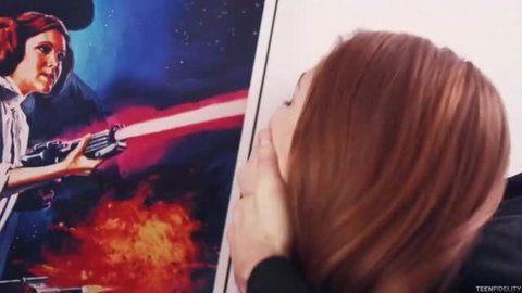 Kimberly Brix redhead nerd girl with lightsaber poster