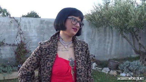 Candy Scott in leopard print coat and red dress at outdoor cabaret
