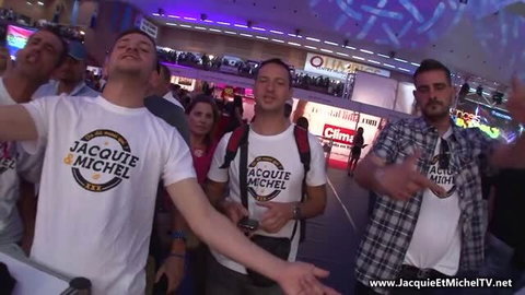 Jacquie et Michel fans at Barcelona festival wearing branded t-shirts