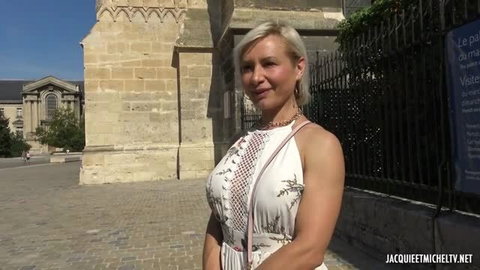 Kim mature blonde MILF in floral dress posing outdoors