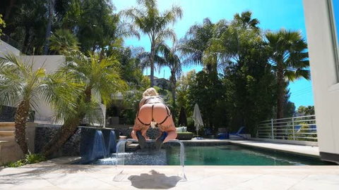 Kali Roses in black harness lingerie bent over poolside outdoors