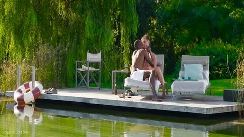 Sofi in passionate outdoor couple scene on lake dock