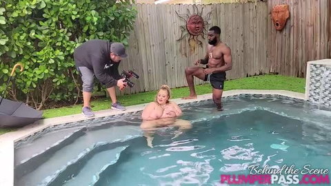 Veronica Jasmine topless in pool with muscular male model during Plumper Pass shoot