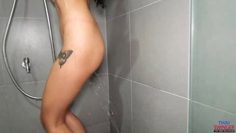 Naked woman with tribal tattoo showering from behind in 4K creampie scene