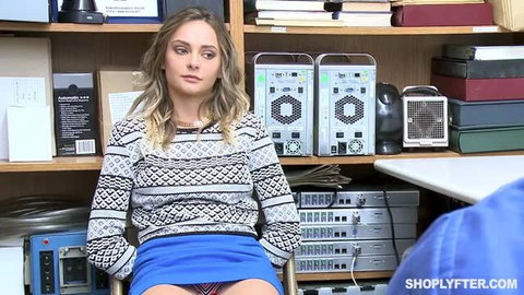 Blonde shoplifter in patterned sweater and blue skirt caught on camera
