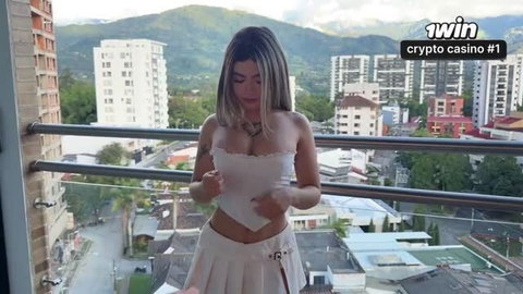 Nath Gomez in white crop top and skirt on balcony, softcore tease