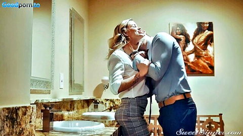 Jessa Rhodes in white blouse and skirt embraces man intimately