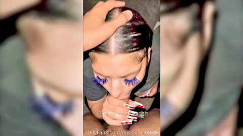Ebony babe with huge blue lashes deepthroating thick cock POV hand gripping hair