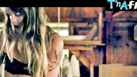 Emma Greenwell in intense sexy scene from Holy Ghost People, blonde hair and tattoo